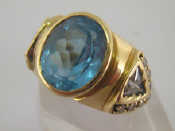 Appraisal: A carat yellow gold and blue topaz dress ring the