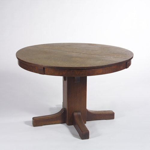 Appraisal: Limbert pedestal dining table with two leaves Original finish to