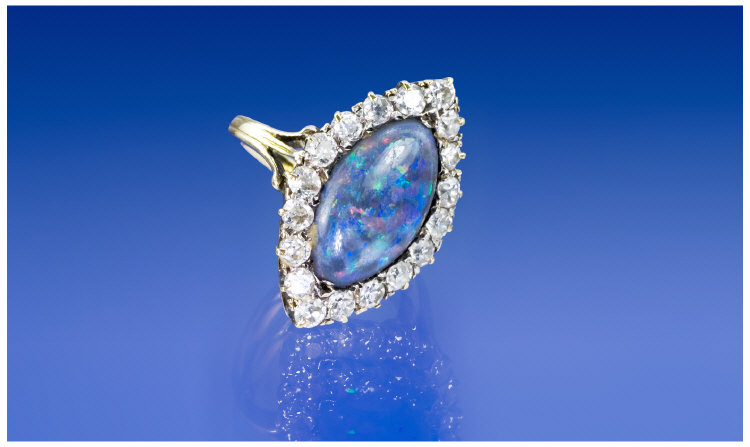 Appraisal: ct Gold Black Opal And Diamond Ring Central Marquise Shaped