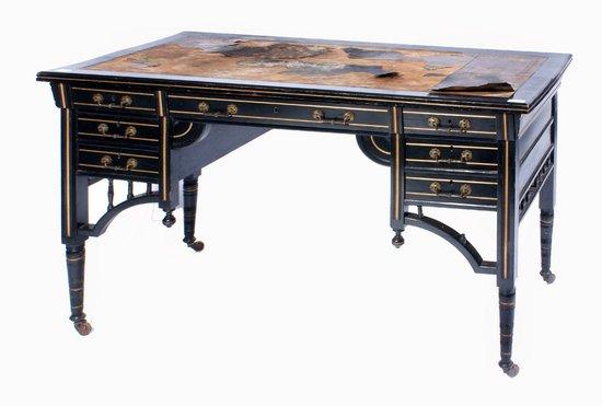 Appraisal: A Victorian ebonised aesthetic writing desk by Maple Co with