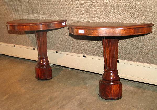 Appraisal: A pair of Classical mahogany console tables second quarter th