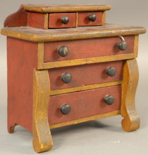 Appraisal: Salesman sample two over three drawer chest in old red