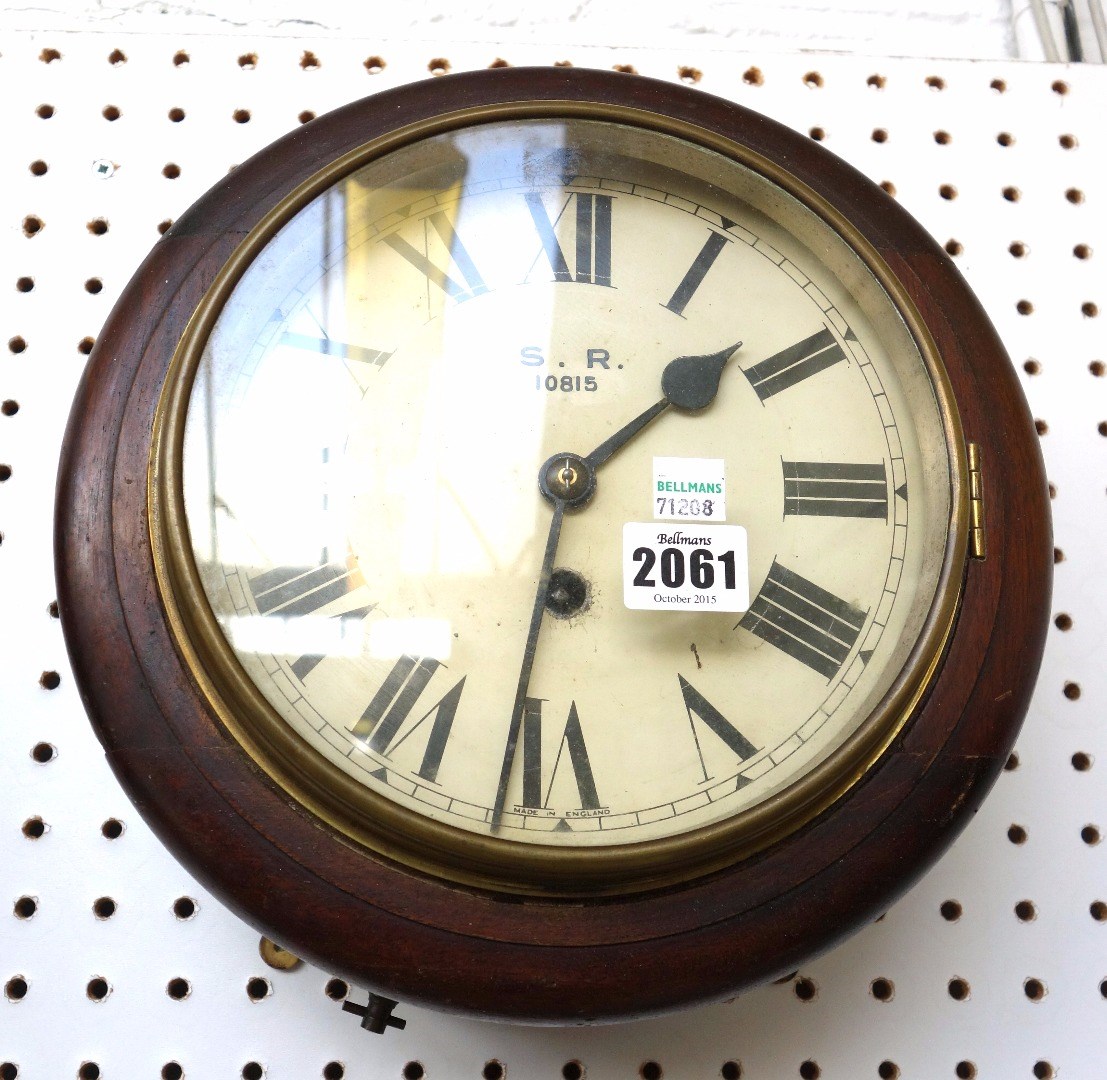 Appraisal: A mahogany cased dial clock late th century the white