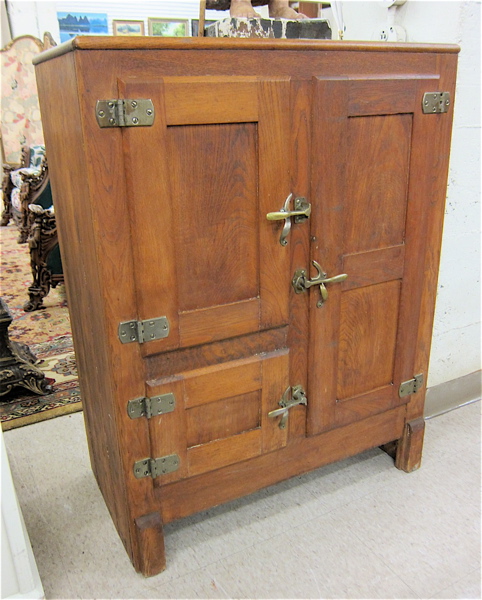 Appraisal: THREE-DOOR OAK ICE BOX American c with original galvanized metal