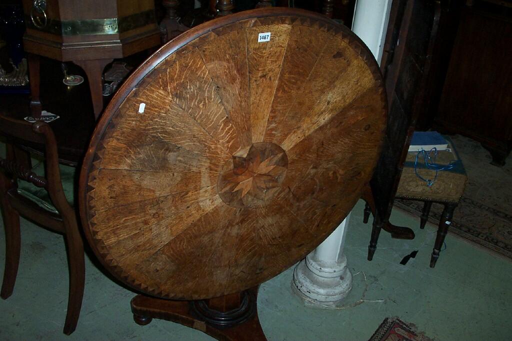 Appraisal: A mid th century oak centre table the circular top