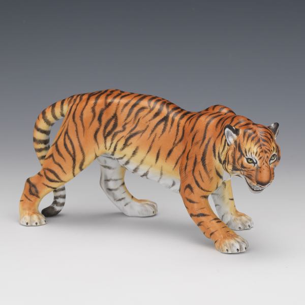 Appraisal: HEREND TIGER FIGURINE x Polychromed porcelain growling tiger marked to