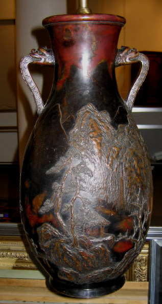 Appraisal: JAPANESE BRONZE VASE Ovoid with flaring neck relief decoration of