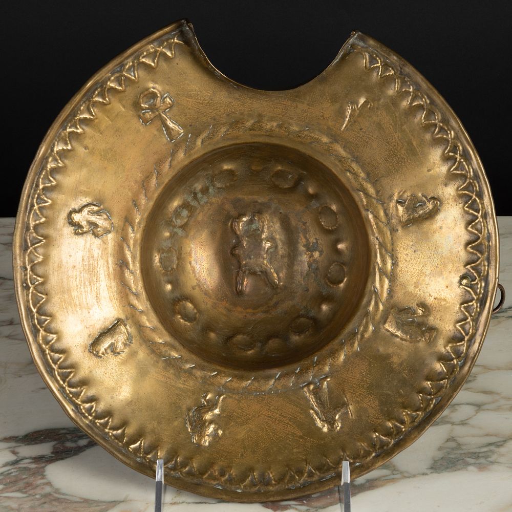 Appraisal: Embossed Brass Shaving Bowl With Coptic cross and figures to