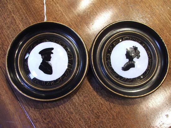 Appraisal: A PAIR OF TH CENTURY CIRCULAR SILHOUETTE PORTRAITS of a