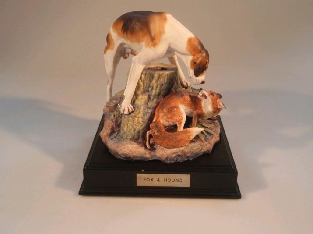 Appraisal: An Albany fine china figure group entitled 'Fox and Hound'