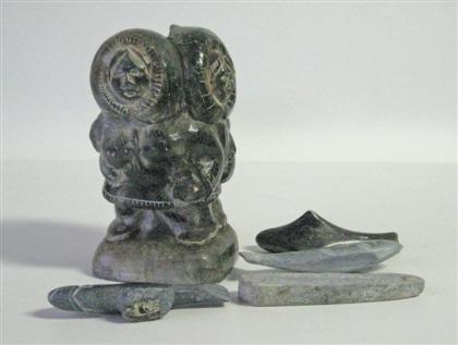 Appraisal: Three Inuit stone carvings th century Including a double figure