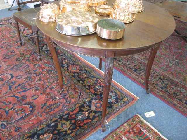 Appraisal: Mahogany Table round top '' diameter carved serpentine legs ''