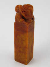 Appraisal: A Chinese hardstone seal with stylised temple dog finial