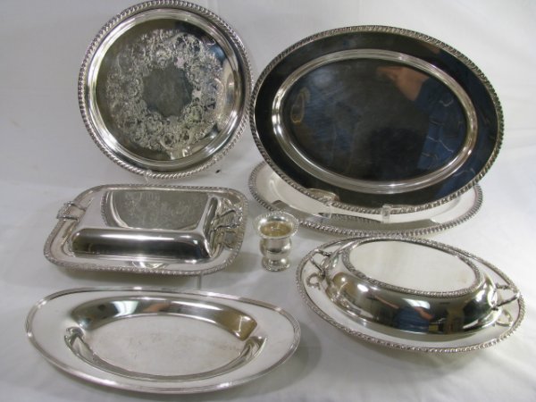 Appraisal: Assorted silver plate trays and two covered casseroles Largest tray