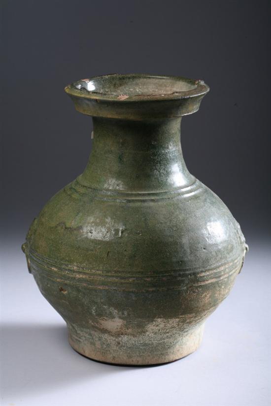 Appraisal: CHINESE GREEN EARTHENWARE JAR Han Dynasty Ovoid -form flanked by