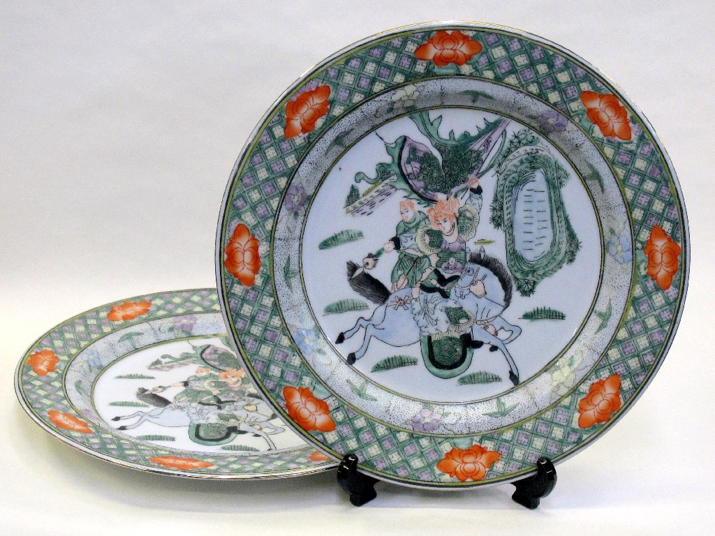 Appraisal: Pair of oriental plates each decorated with a warrior on