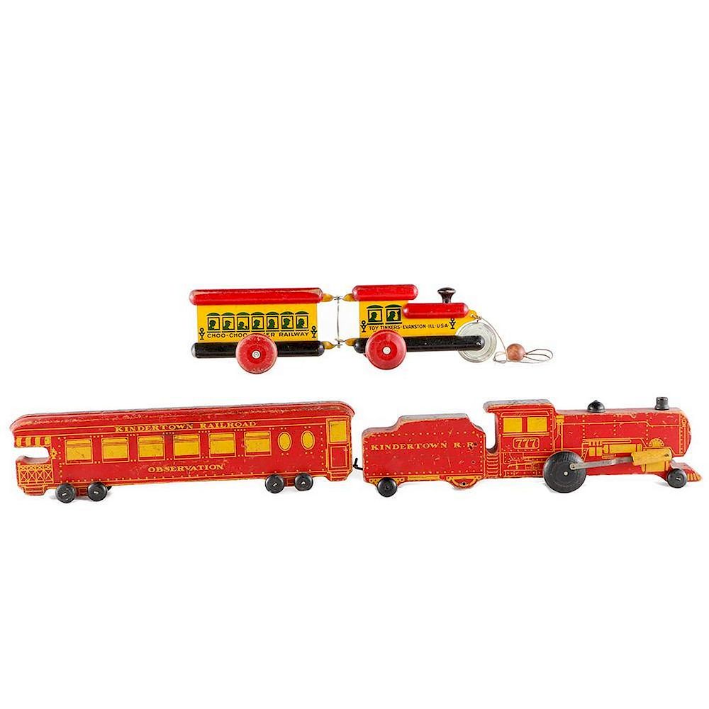 Appraisal: Two railroad pull toys Tinker Railway locomotive and coach litho