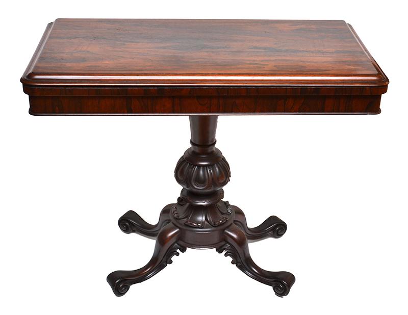 Appraisal: A VICTORIAN ROSEWOOD FOLDOVER CARD TABLE the hinged rounded rectangular