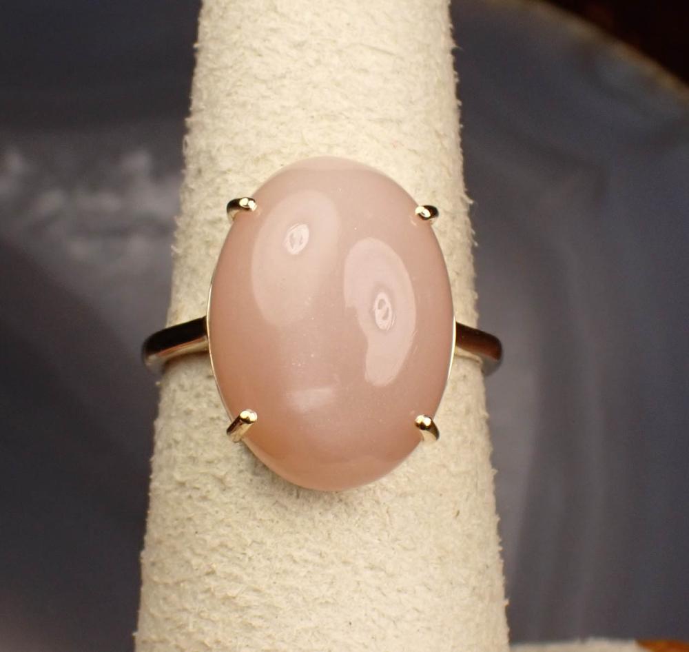 Appraisal: PINK CAT'S EYE MOONSTONE AND FOURTEEN KARAT GOLD RING The