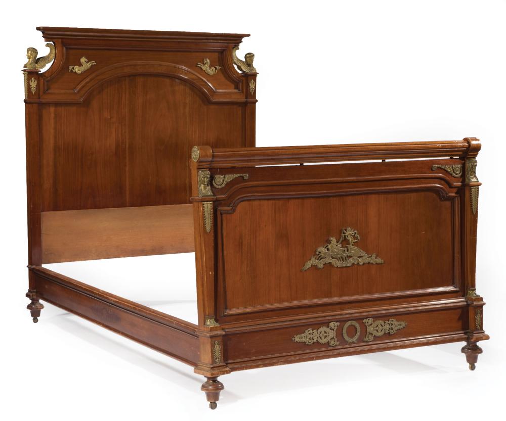 Appraisal: Empire-Style Bronze-Mounted Mahogany Bedstead molded cornice shaped inset panel winged