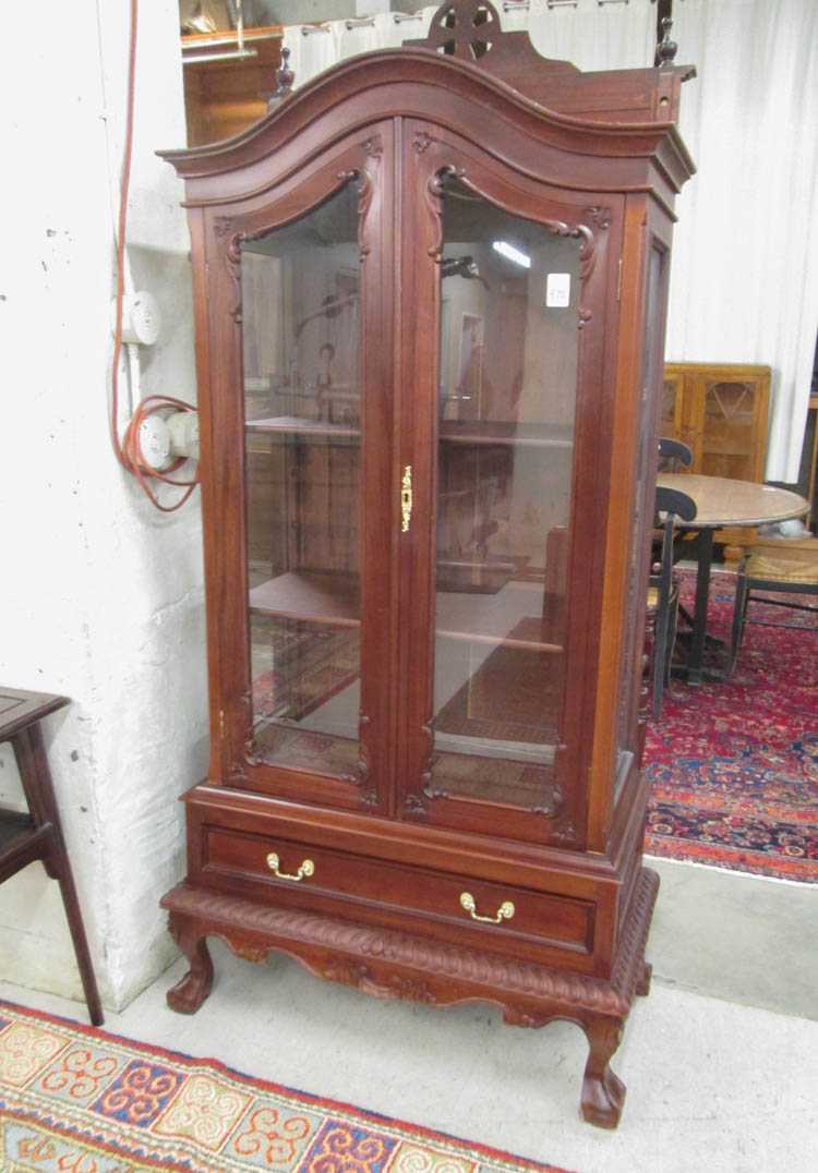 Appraisal: CHIPPENDALE STYLE MAHOGANY CHINA CABINET ON STAND having an arch