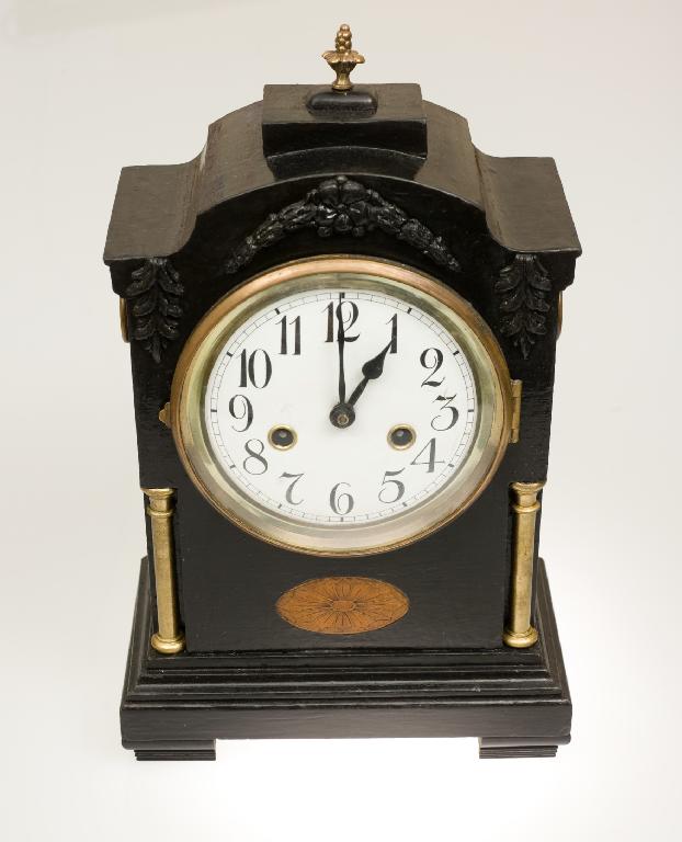 Appraisal: EARLY th CENTURY EBONISED MANTEL CLOCK the broken-arch case inlaid