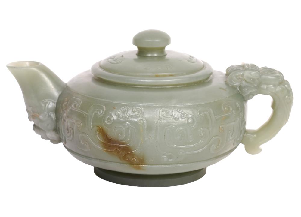 Appraisal: CHINESE CARVED JADE TEAPOTChinese jade teapot carved in high relief