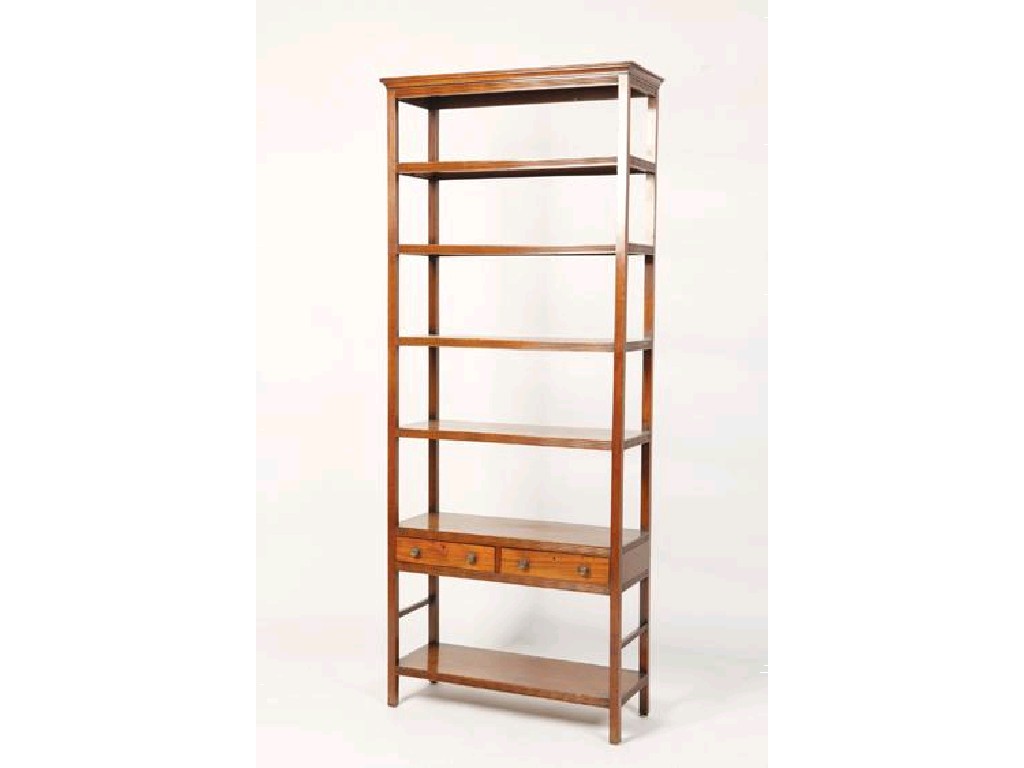 Appraisal: A MAHOGANY ETAGERE in the manner of Gillows of Lancaster