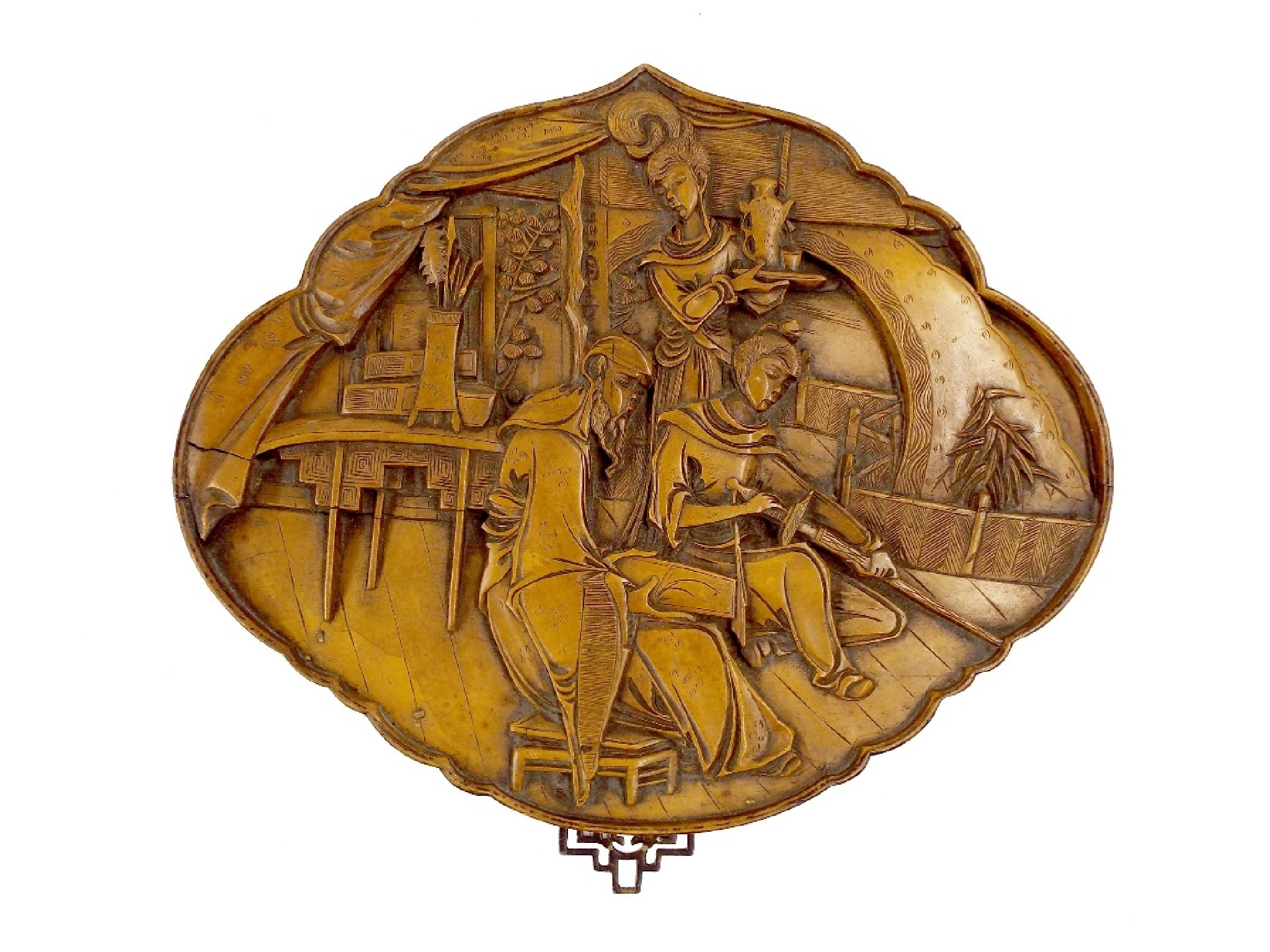 Appraisal: Japanese carved boxwood relief panel decorated with an interior scene