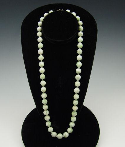 Appraisal: CHINESE STONE BEAD NECKLACE '' strand of jade green stone