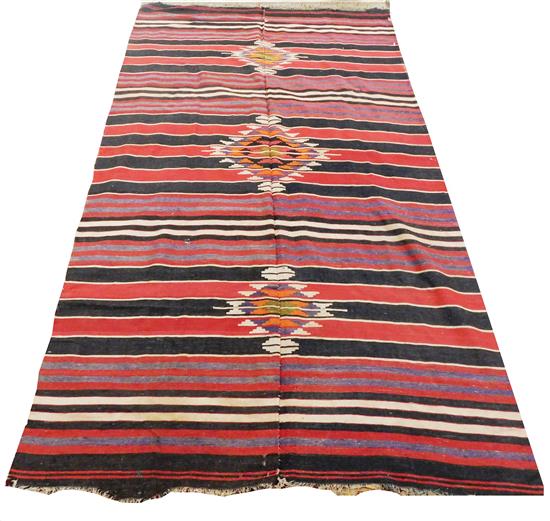 Appraisal: RUG Semi-Antique Persian Kilim hand woven carpet alternating red black