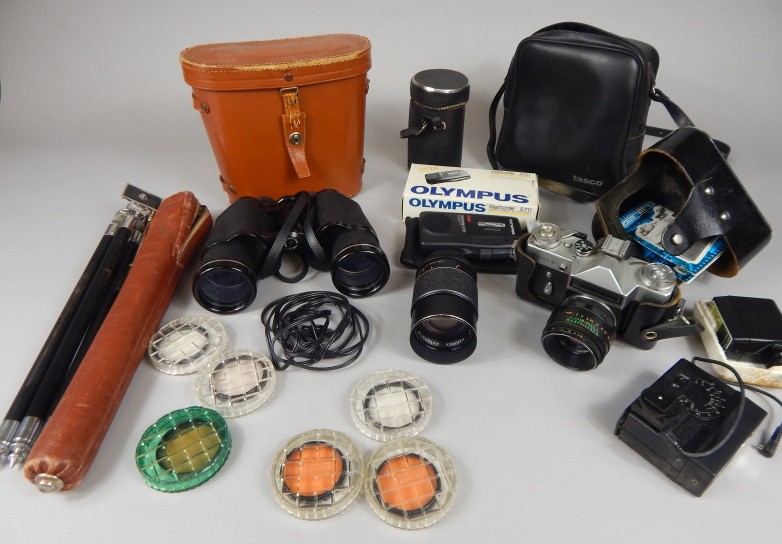 Appraisal: A Zenit camera tripod various accessories and a par of