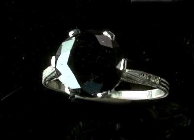 Appraisal: Platinum and Black Diamond Solitaire Ring featuring a - carat