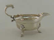 Appraisal: A George II silver sauceboat with shaped rim hoof feet