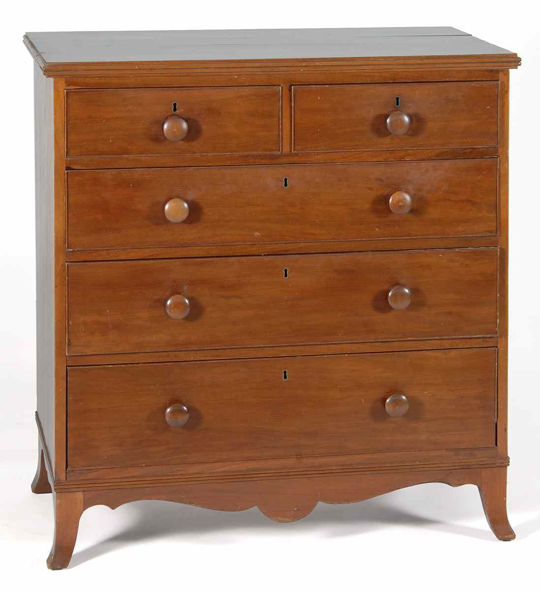 Appraisal: ANTIQUE AMERICAN FOUR-DRAWER CHEST-OF-DRAWERS In cherry with molded top Two