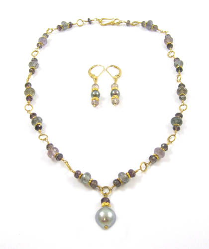 Appraisal: THREE ARTICLES OF BLACK PEARL JEWELRY including an k yellow