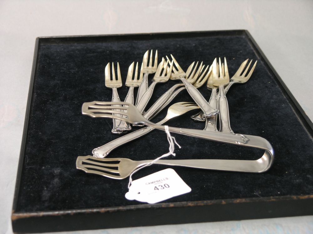 Appraisal: A set of twelve continental white metal cake forks and