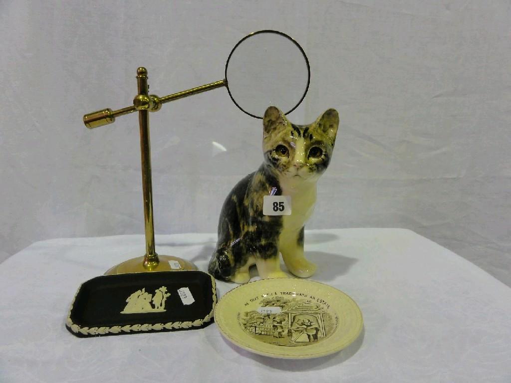 Appraisal: A Winstanley model of a tabby and white seated cat