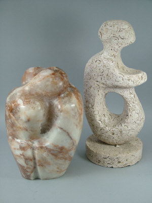 Appraisal: A Contemporary travertine figure of a stylised woman on circular