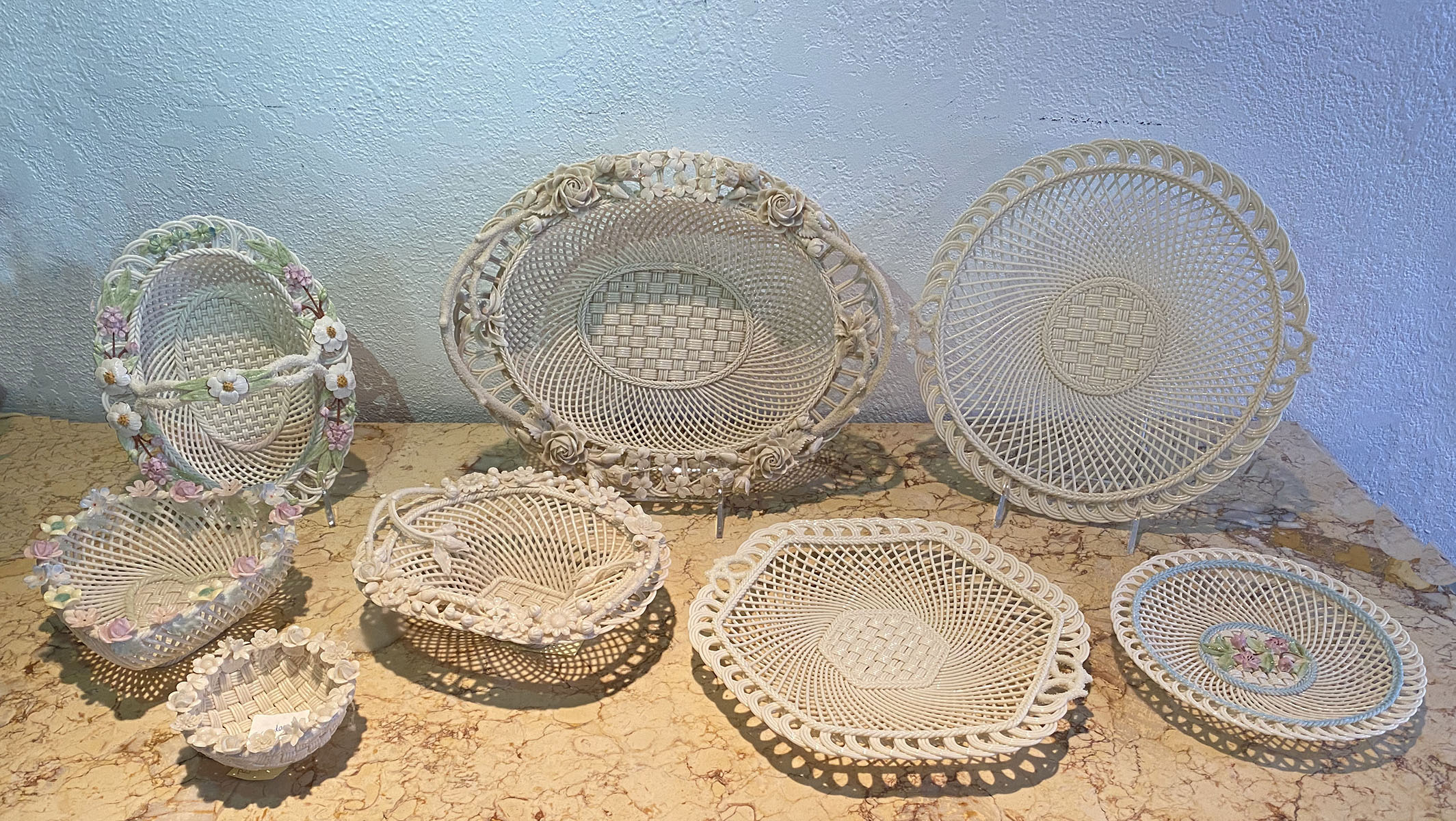 Appraisal: PIECE LOT BELLEEK BASKETS AND NAPKIN HOLDERS '' Twigg style