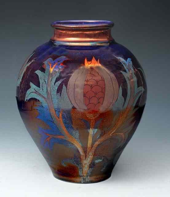 Appraisal: Jonathan Chiswell Jones British b A 'Pomegranates' lustre vase monogrammed