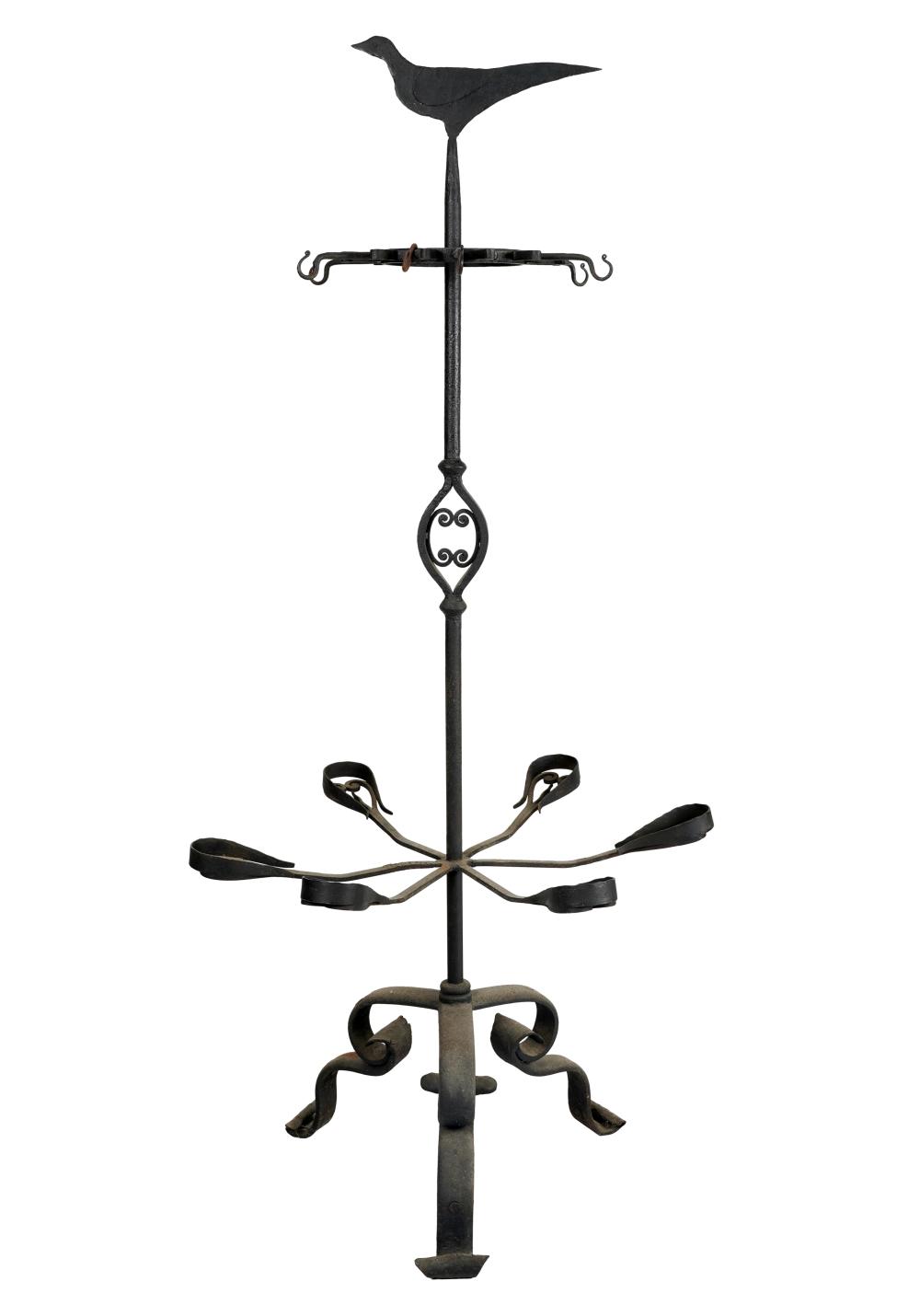 Appraisal: WROUGHT-IRON GUN RACKhaving six arms surmounted by a figure of