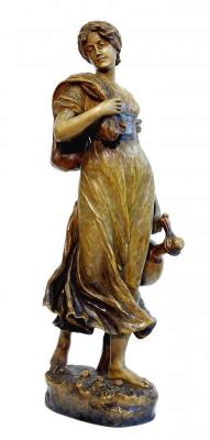 Appraisal: A GOLDSCHEIDER POTTERY FIGURE modelled as a girl carrying a