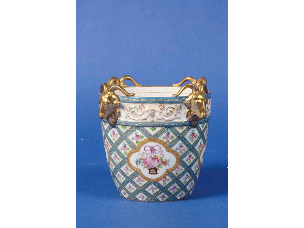 Appraisal: A SEVRES STYLE CACHEPOT the cream ground decorated with pale