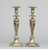 Appraisal: A Pair of Weighted Sterling Silver Candlesticks A pair of