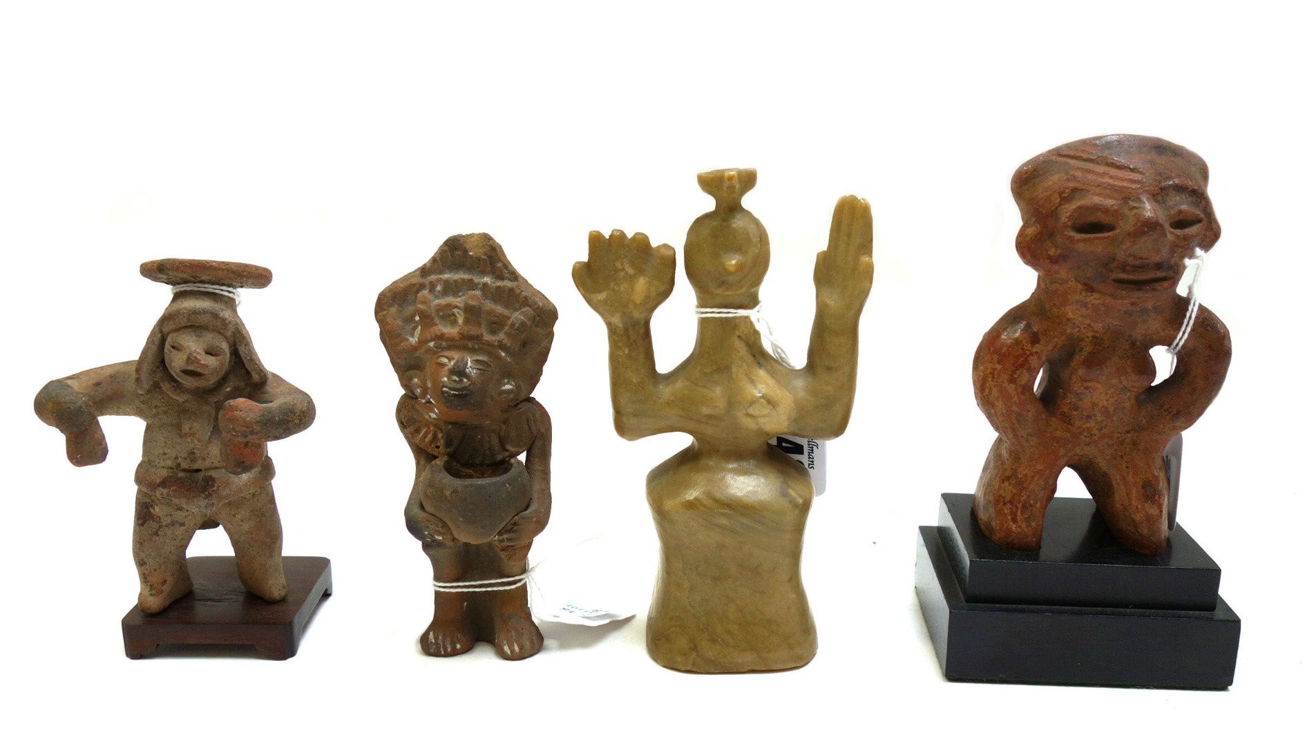 Appraisal: Three small Pre-Columbian style terracotta figures including a Colima style