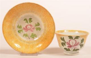 Appraisal: Yellow Spatter Adams Rose Cup and Saucer Yellow Spatter China