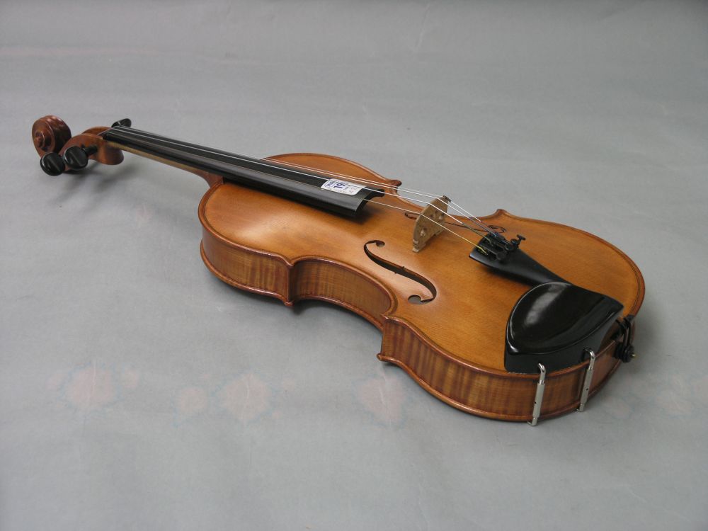 Appraisal: A violin signed J E Vickers in half-veneered back stamped