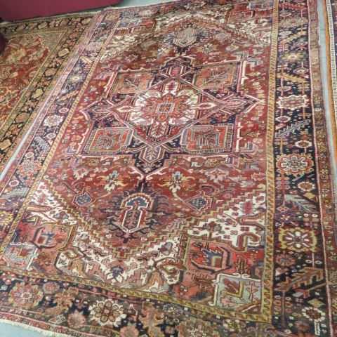 Appraisal: Heriz Persian Handmade Room Size Rugcentral medallion earthtones geometric and