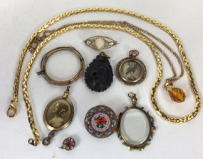 Appraisal: A collection of Victorian pinchbeck pendants and brooches including pendant